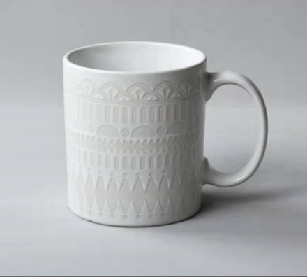 VINTAGE EMBOSSED CERAMIC CUP