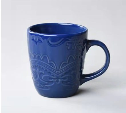 VINTAGE EMBOSSED CERAMIC CUP