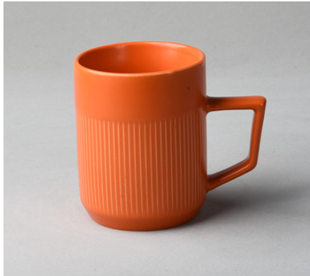 VINTAGE EMBOSSED CERAMIC CUP